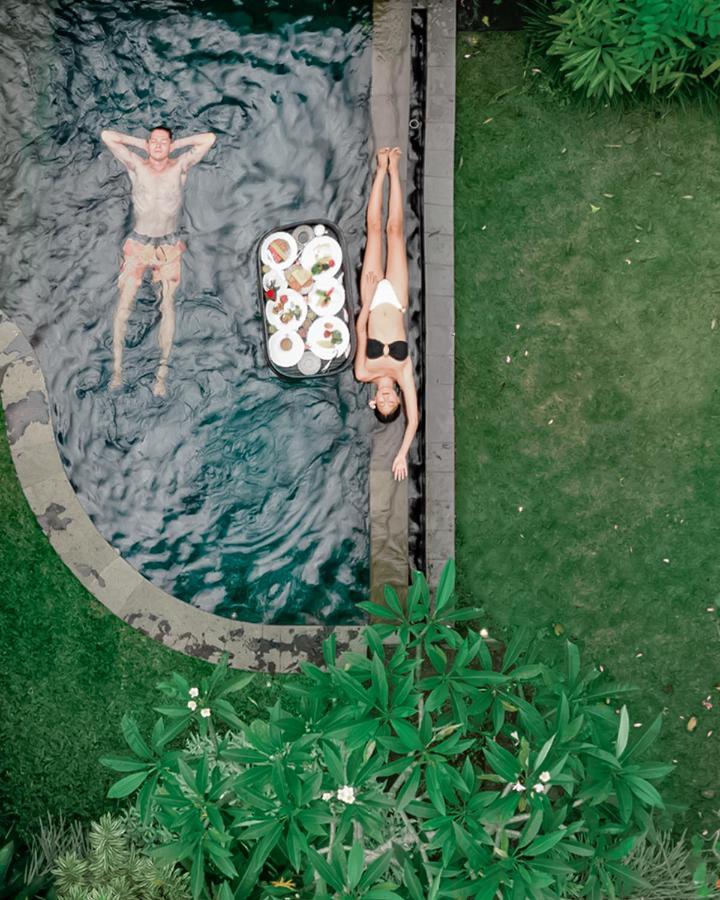 Tejaprana Bisma - Chse Certified Hotell Ubud Exteriör bild A woman sunbathing in a swimming pool